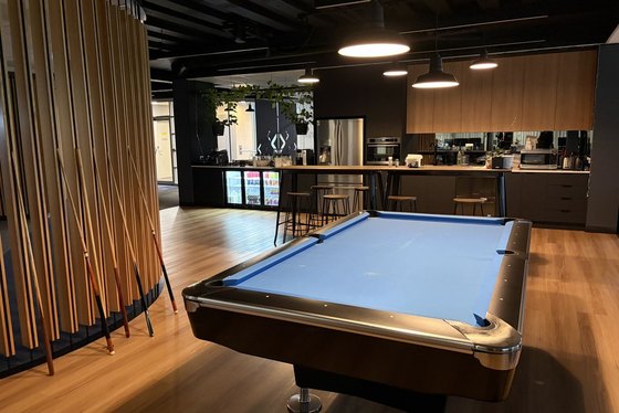 Pool table and kitchen
