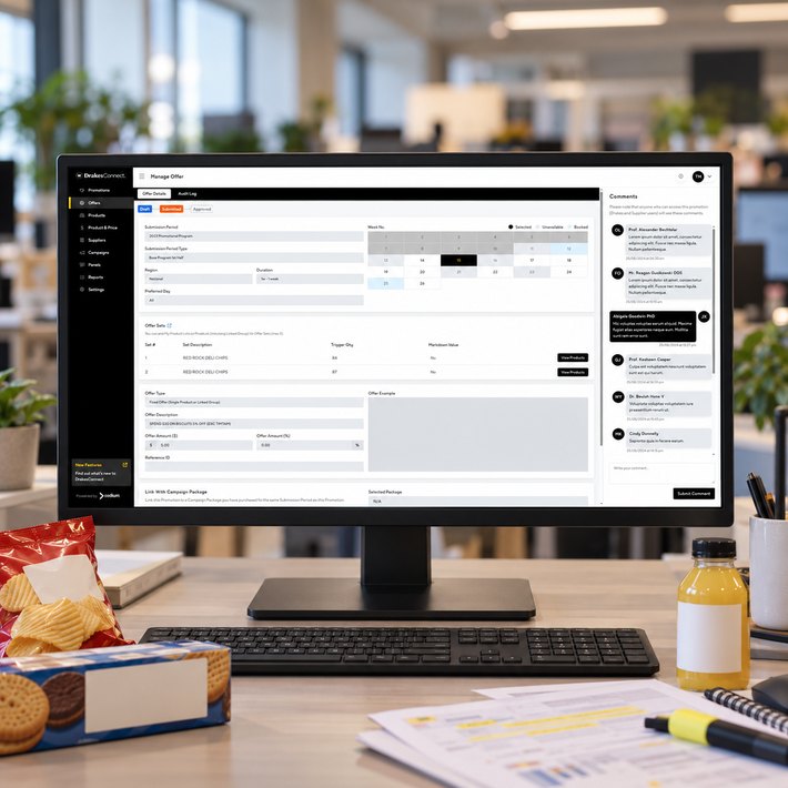 DrakesConnect manage offer screen on a buyer's desk with product samples and printed promotion sheets